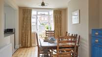 View of the dining area leading out to the garden.