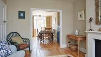 The comfortable open plan living and dining area leading out to the garden.