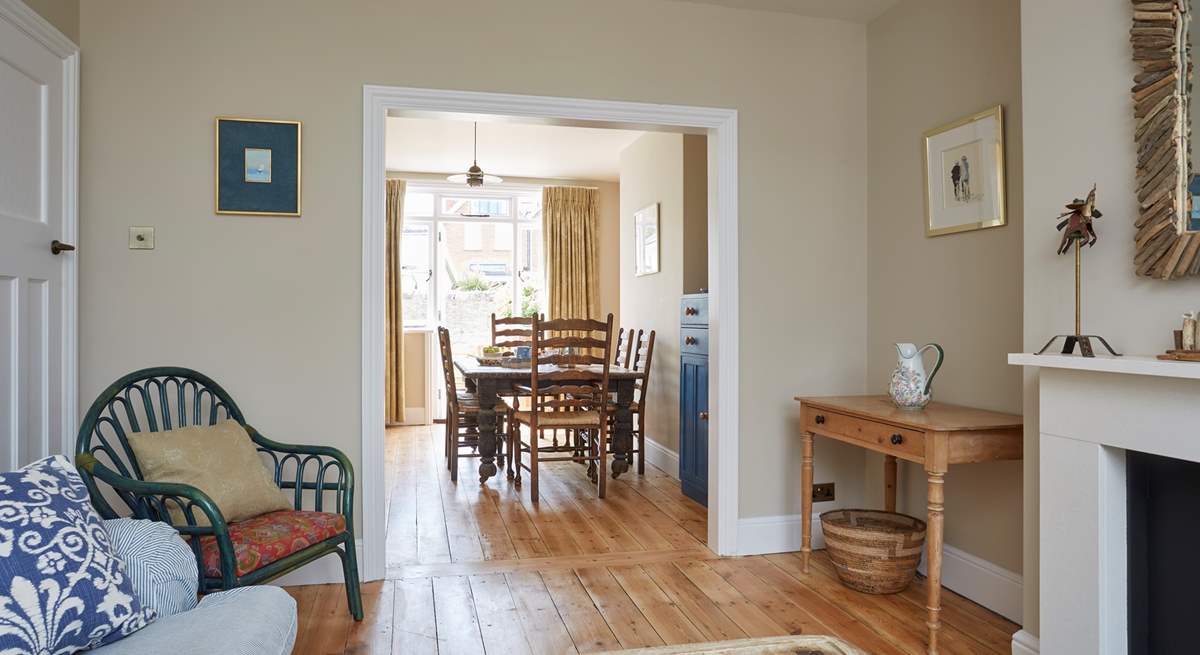 The comfortable open plan living room and dining area leading out to the garden.