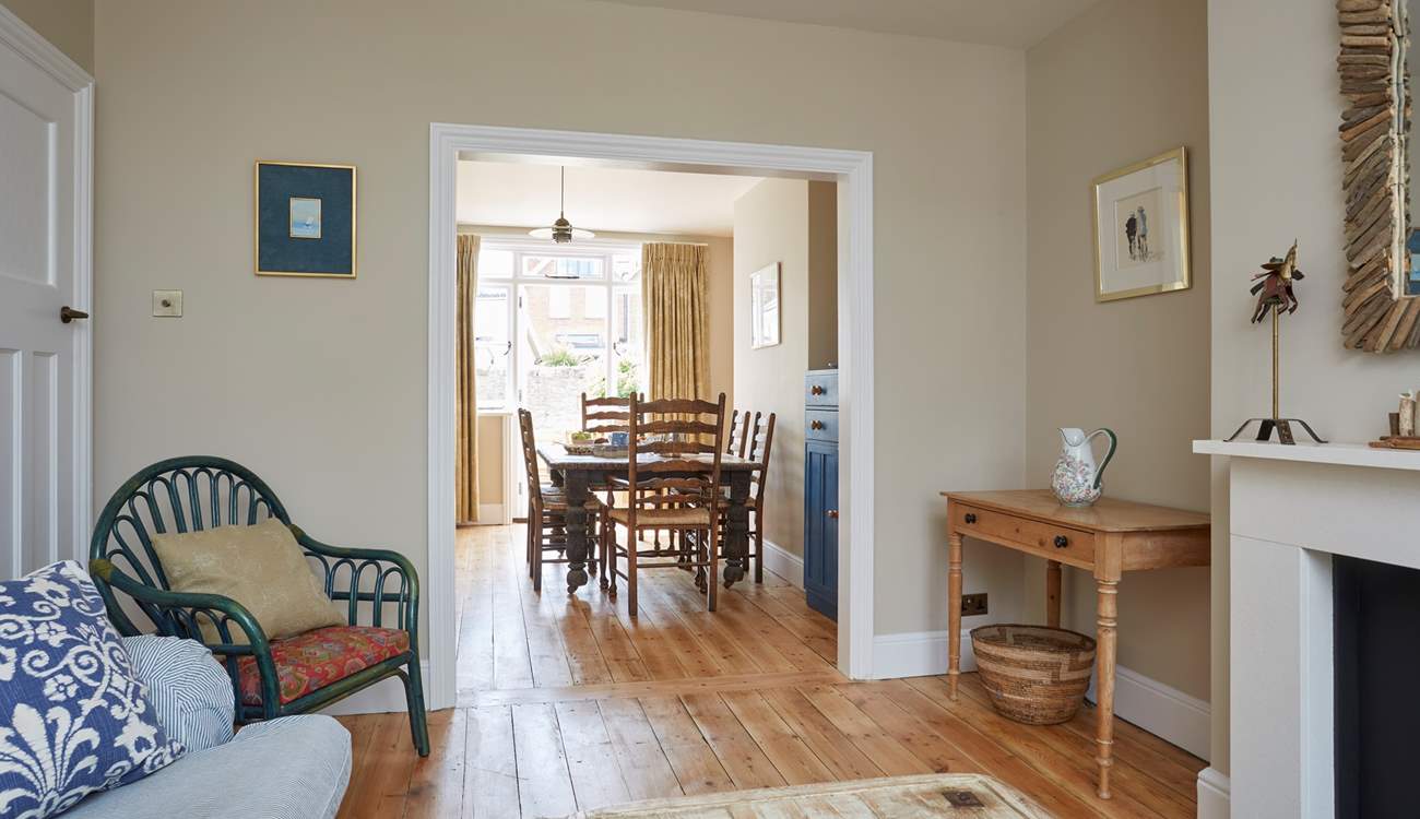 The comfortable open plan living room and dining area leading out to the garden.