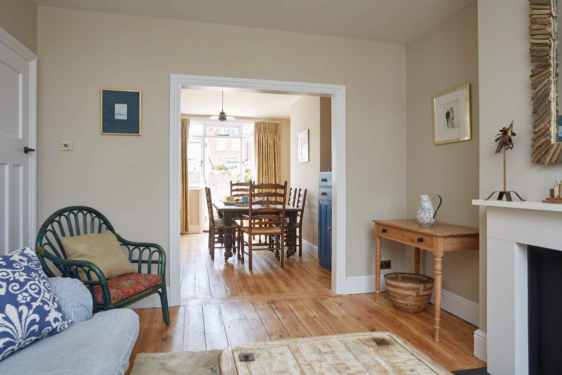 The comfortable open plan living room and dining area leading out to the garden.