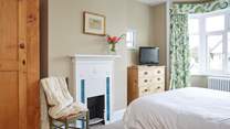 The bright main bedroom to the front of the house.