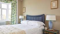 The principal bedroom with king-size double bed facing the front of the house.
