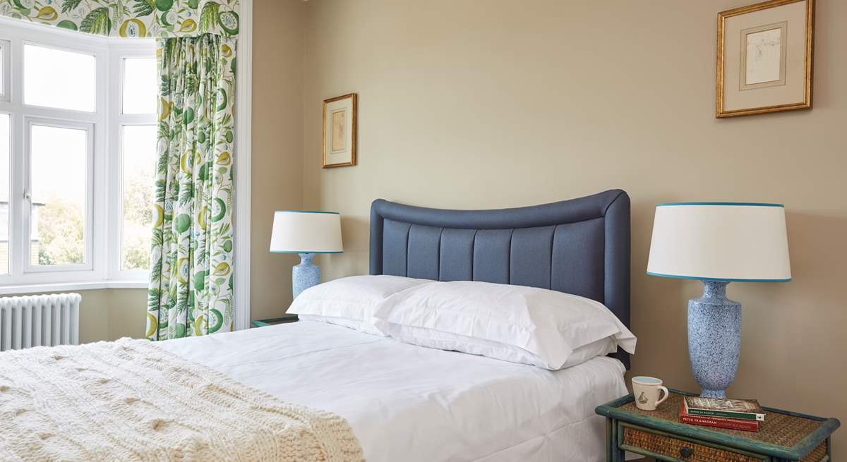 The master bedroom with king-size double bed facing the front of the house.