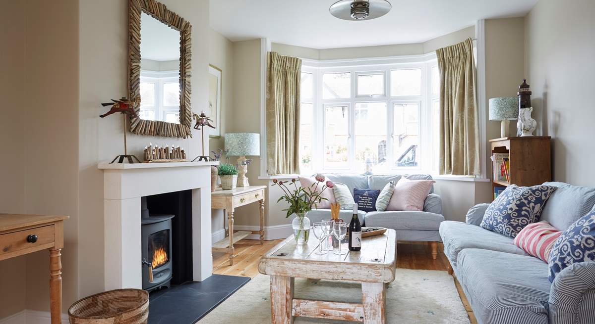 The lovely living room with wood-burner.