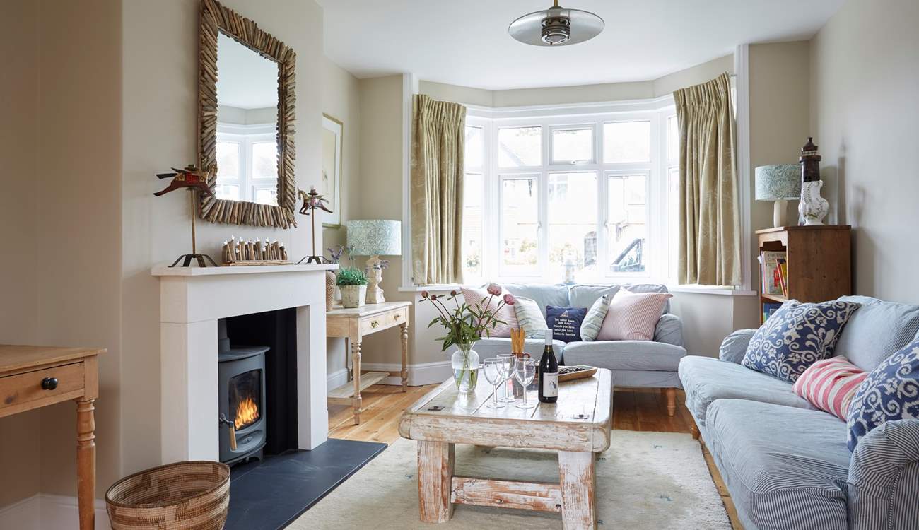 The lovely living room with wood-burner.
