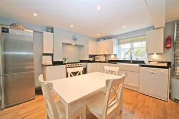 The large kitchen is both modern and fully equipped