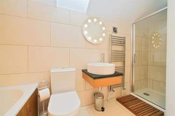 Lovely modern bathroom with a shower, on the first floor.