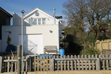 The rear of Creekside, with the creek behind you.