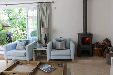 With a wood-burner for the cooler months, this makes a perfect holiday home all year round.