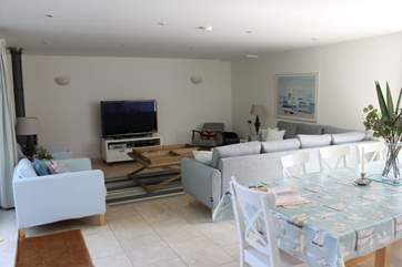 This open plan living space is perfect for a family gathering.