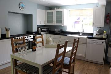 The large kitchen/breakfast-room is both modern and fully equipped.