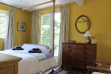The double bedroom looks out to the side of Creekside with slight views of the creek and with connecting landings to the other bedrooms on the same floor.