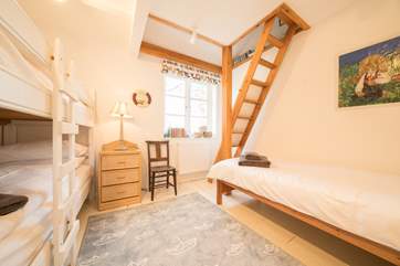 The third bedroom is perfect for the children. Please note the ladder is blocked off to restrict access and not for guests' use.