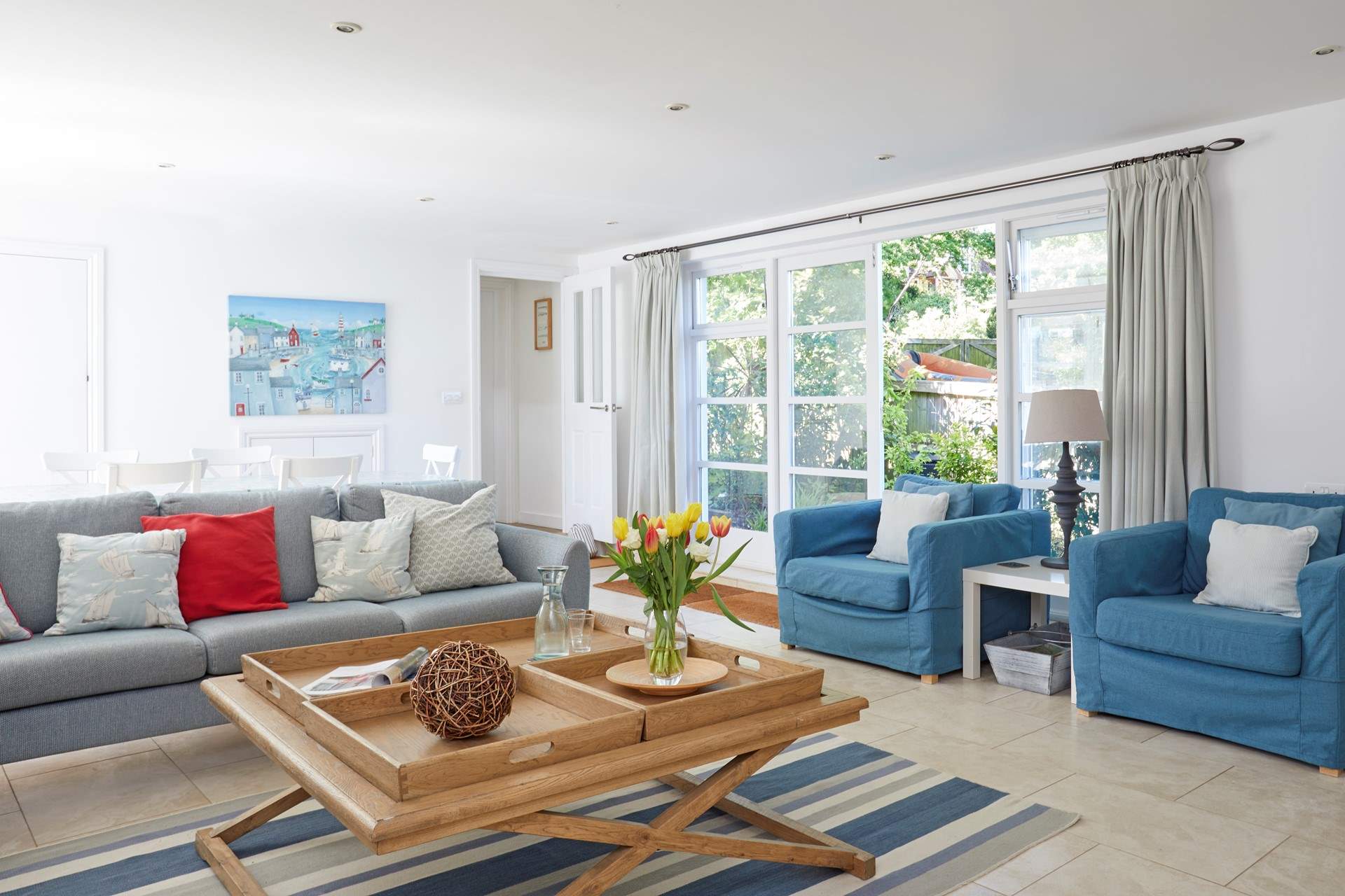 The spacious sitting/dining-room is beautifully decorated and a perfect place for all the family to relax. 