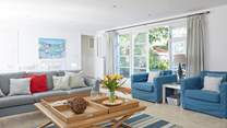 The spacious sitting/dining-room is beautifully decorated and a perfect place for all the family to relax. 