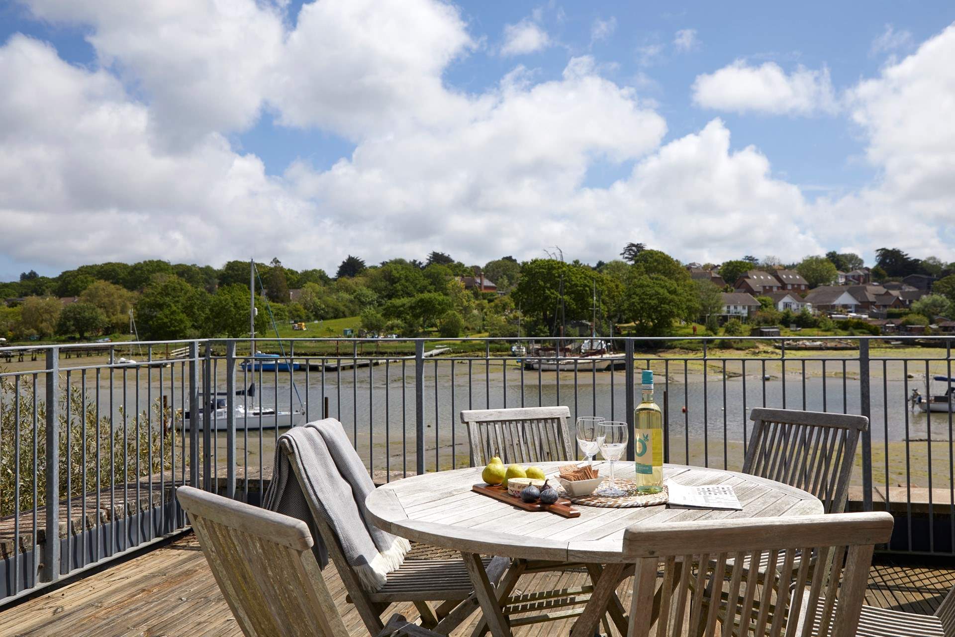 This balcony is accessed from the bedroom at the back of the house with outside seating, views over the creek it is a real sun-trap.  