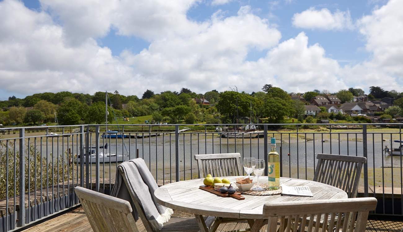 This balcony is accessed from the bedroom at the back of the house with outside seating, views over the creek it is a real sun-trap.  