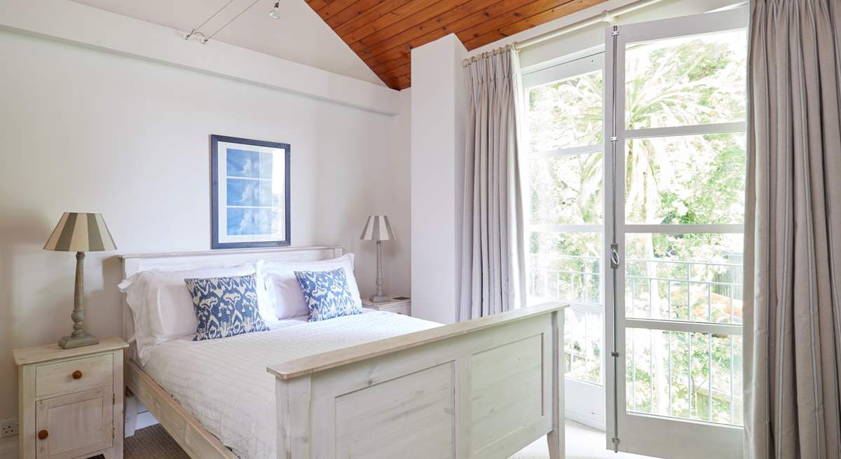 Enjoy the breeze from the Juliet balcony in the fourth bedroom...