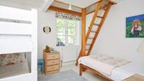 The third bedroom is perfect for the children. Please note the ladder is blocked off to restrict access and not for guests' use.