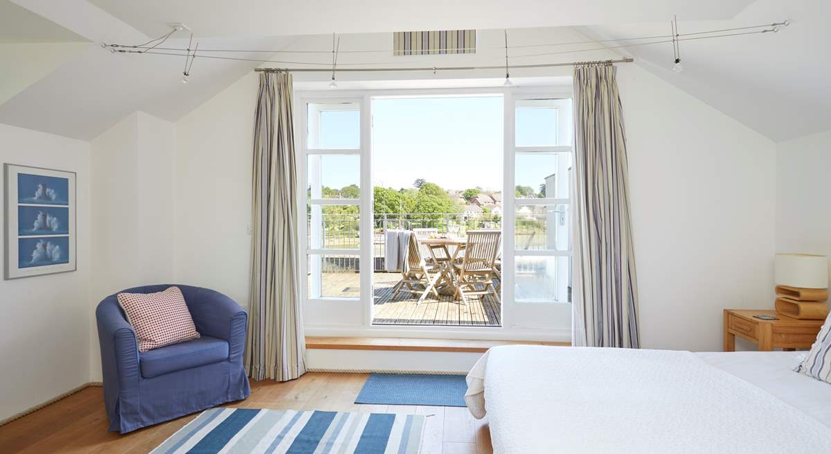 The lovely first floor main bedroom with its private balcony.