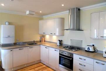 A beautiful and modern kitchen, well-equipped with everything you will need.