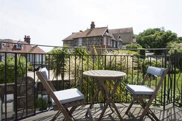 Enjoy a glass of something chilled on the balcony.