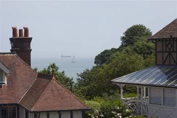 Watch passing boats with views out to sea.