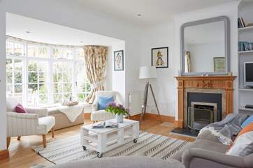 Rest up in the cosy sitting-room with plenty of seating for all.