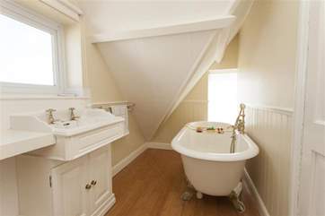The roll-top bath is perfect for long luxurious soaks.