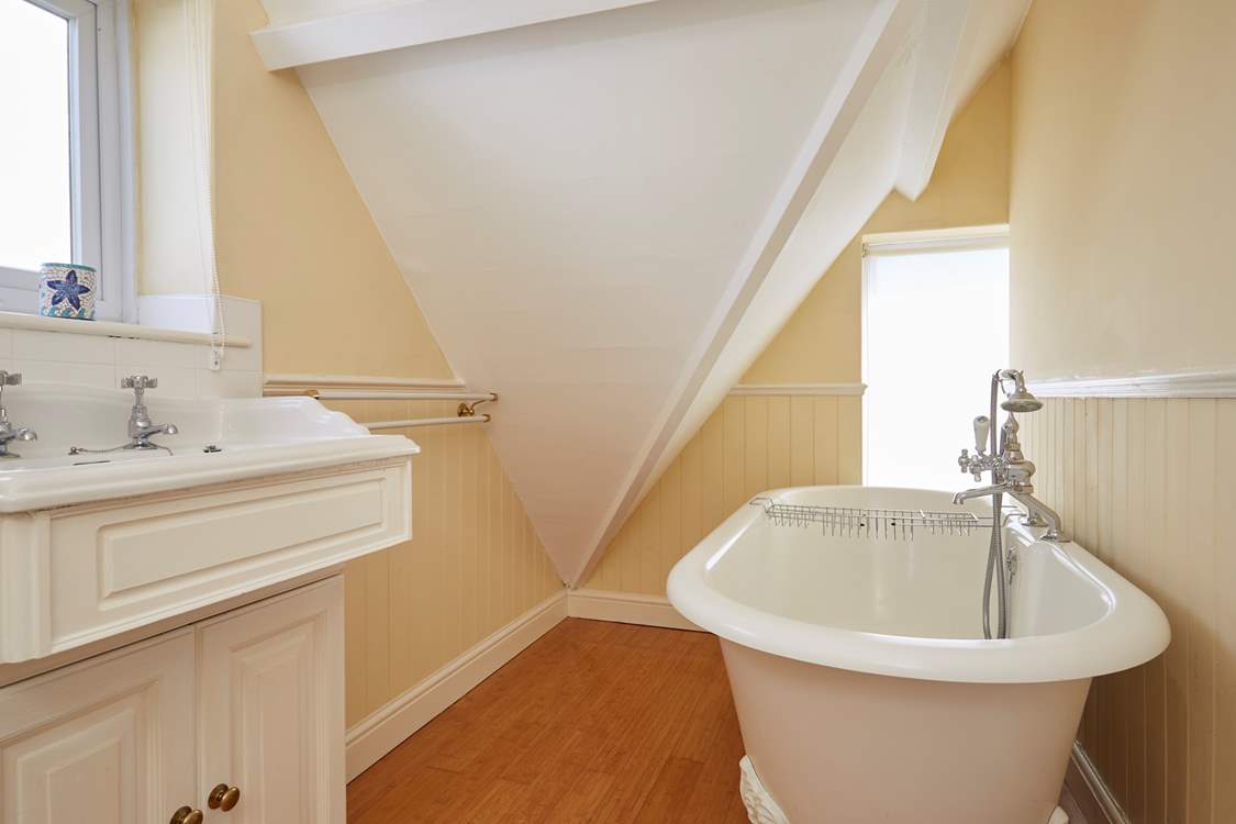 The roll-top bath is perfect for long luxurious soaks.