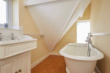 The roll-top bath is perfect for long luxurious soaks.