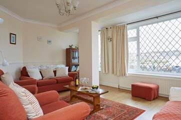 Plenty of comfortable seating for all in the sitting-room.