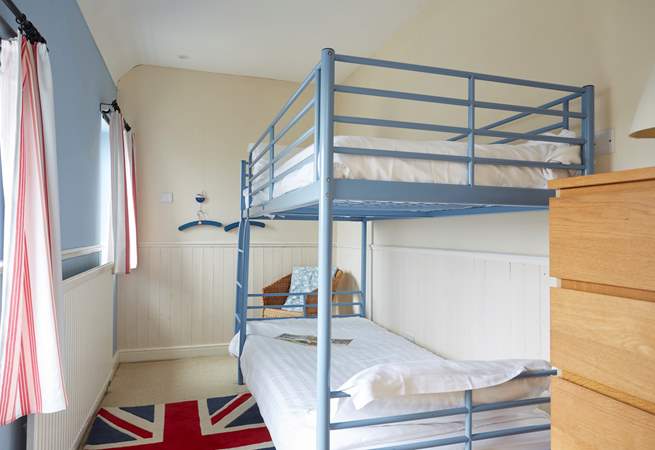The bunk bedroom is suitable for children or adults.