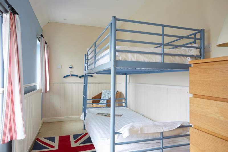 The bunk bedroom is suitable for children or adults.