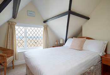 The main bedroom on the first floor with sea views. 