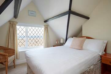 The main bedroom on the first floor with sea views.