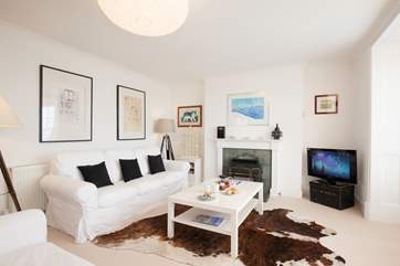Read a book, watch TV and talk about your day in the cosy sitting-room.