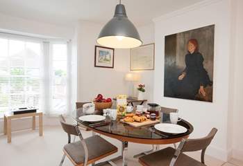 The dining-room is a light and airy room.