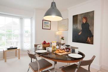 The dining-room is a light and airy room.