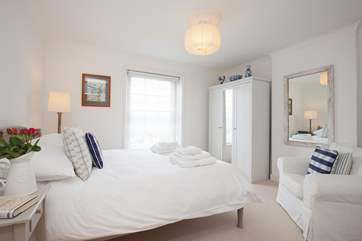 The superb master bedroom with comfy king-size bed.