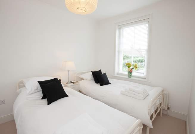 The light twin bedroom is suitable for adults or childen alike. Please note this bedroom can be accessed via the single bedroom.