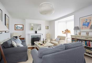 The gorgeous and spacious sitting-room with ample seating and marvellous sea views.