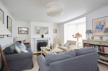 The gorgeous and spacious sitting-room with ample seating and marvellous sea views.