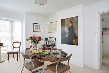 The dining-room is a light and airy room.