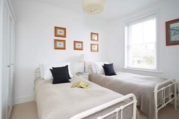 The bright twin bedroom is suitable for adults or children alike. Please note this bedroom can be accessed via the single bedroom.