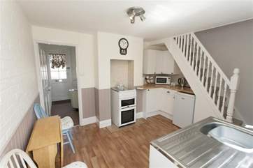 The compact kitchen/diner. Please note that the stairs are quite narrow.
