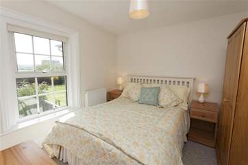 The bedroom overlooking the garden.