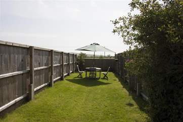 The sunny enclosed garden.