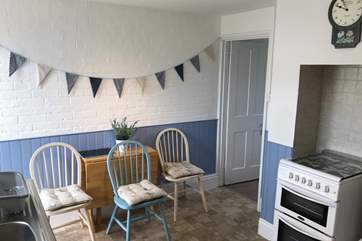 The drop-leaf dining-table.
